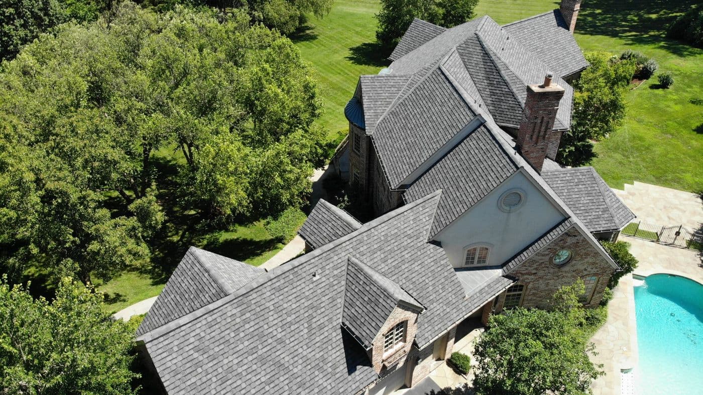 Aerial view of a completed residential roof replacement on a St. Louis home