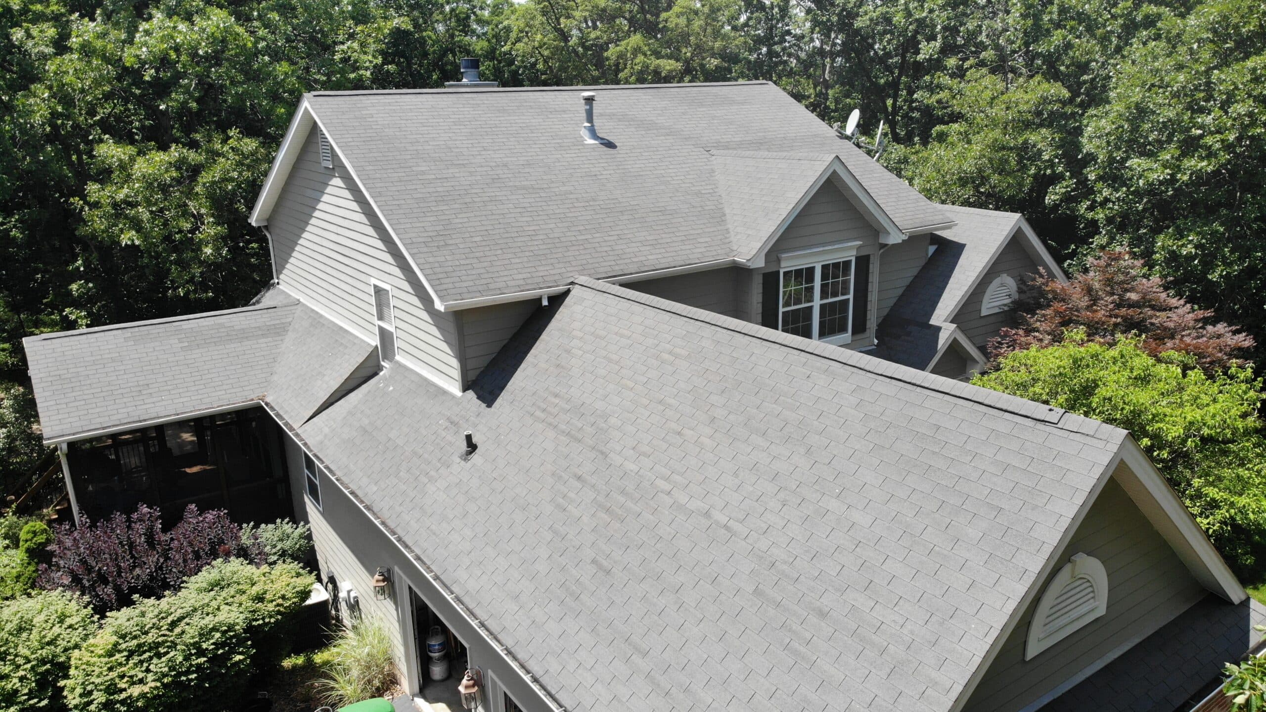Aerial view of finished asphalt shingle roof